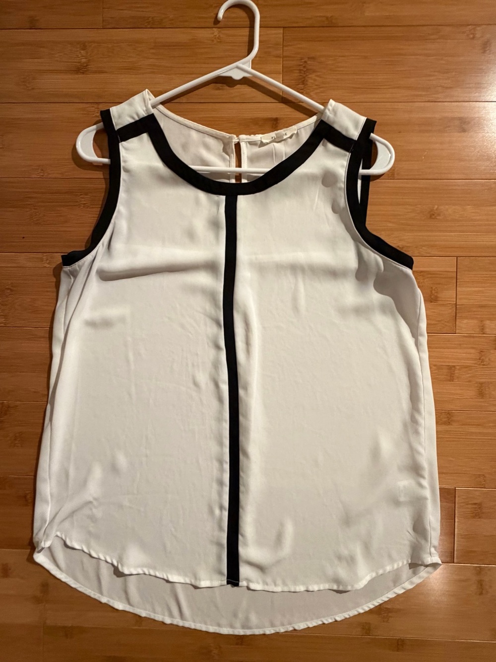 Pleione White Sleeveless Blouse with Black Contrast Trim